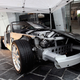 Illustration for article titled Half A Cutaway Aston Martin DB9 Is Twice As Sexy